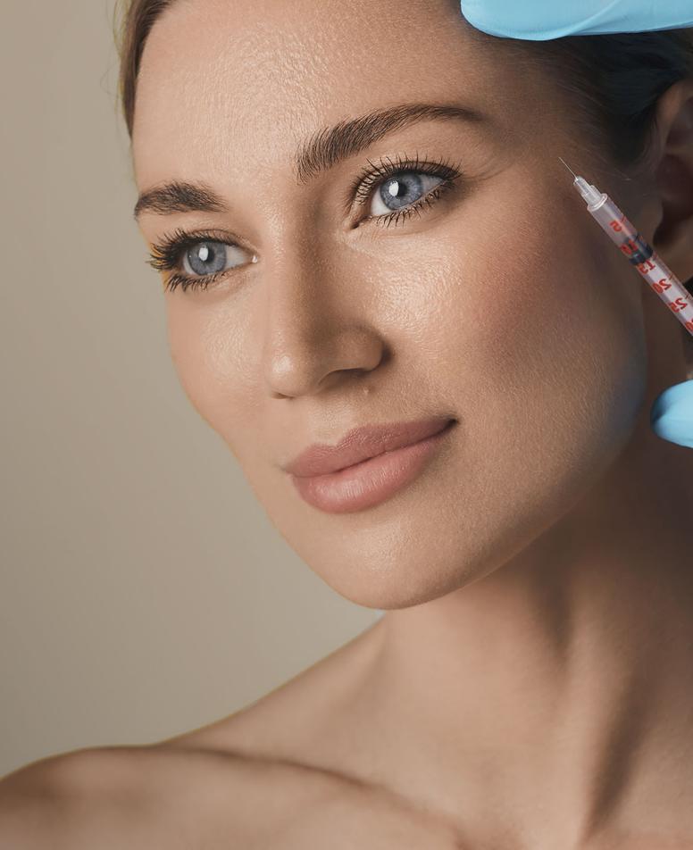 Close-up of a woman receiving a facial injection